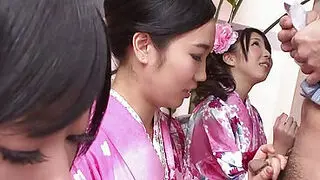 Three geishas sucking on one lonely cock